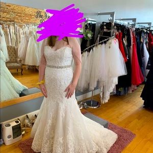 Wedding dress! Never worn! Size 14 but can fit smaller!